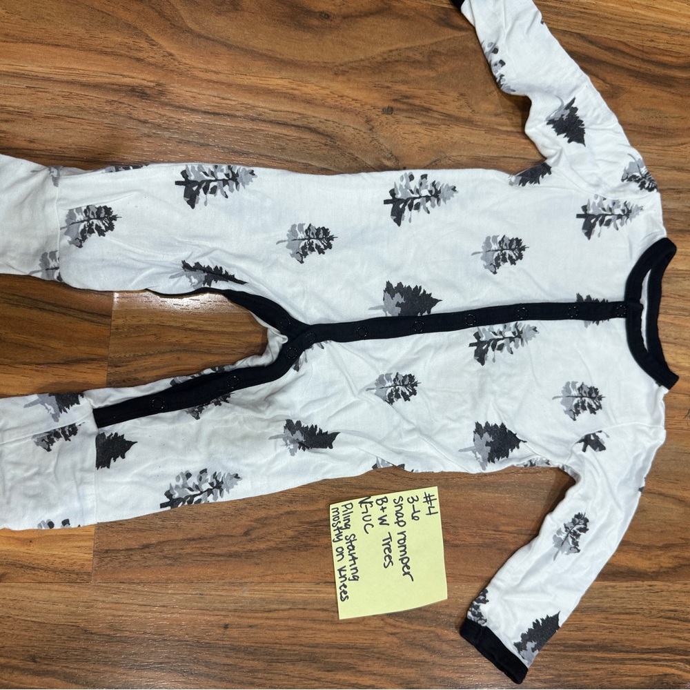 Kyte BABY White and Black Footed One Piece